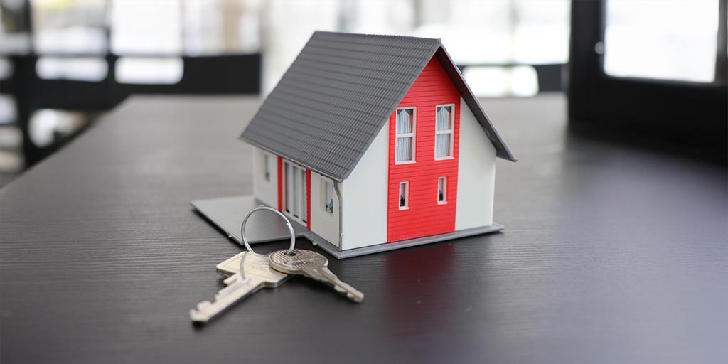 Hausmodell mit Schlüsseln – Informationen für Hauseigentümer zum Glasfasernetz von Siggenthal4net in Untersiggenthal und Obersiggenthal